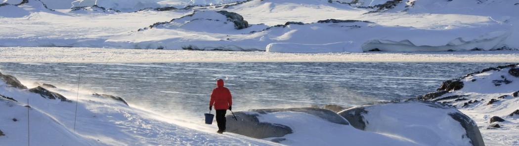 Man goes fishing in the middle of winter