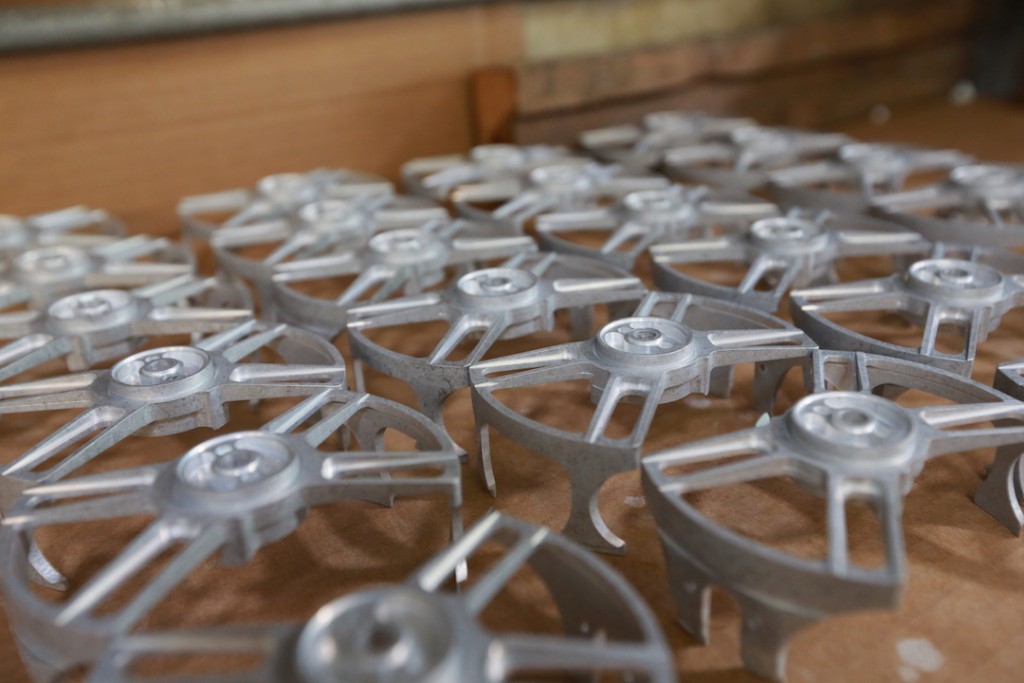 Table full of the new nautilus reels x-series before they are finished