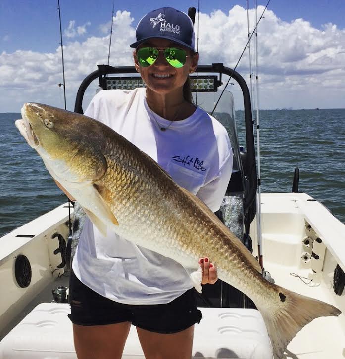 Breelan Angel with a bull redfish